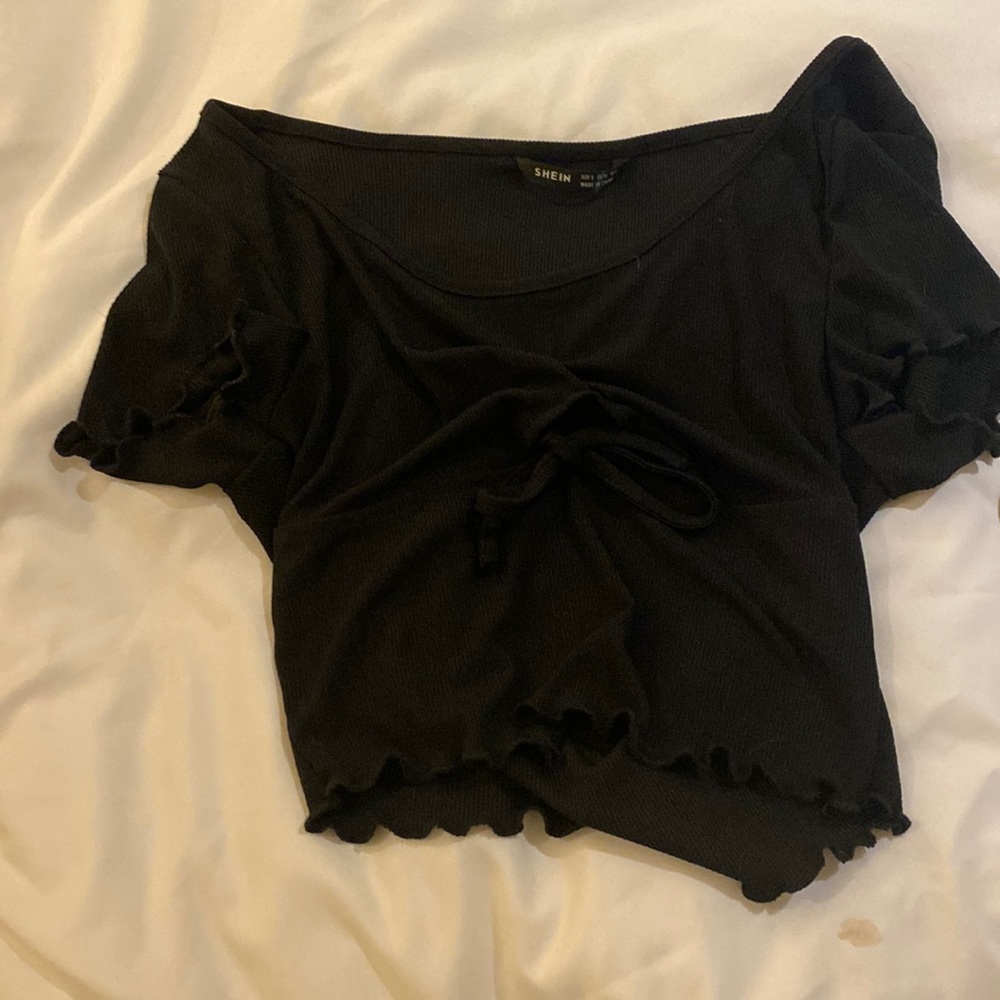 Black she and tie shirt